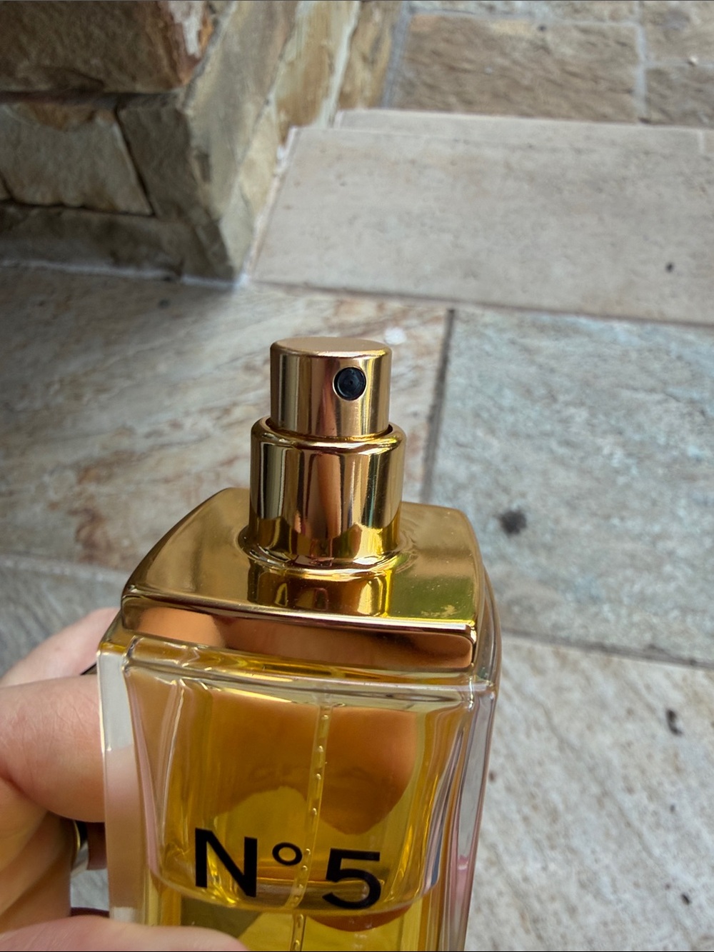 CHANEL — Clear Bottle with Black Cap and Golden Liquid - Picture 5 of 9